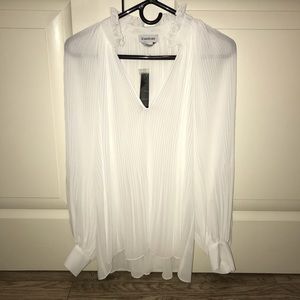 Bebe accordion blouse size L